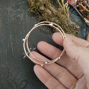 FULL CIRCLE - Bronze & Sterling silver hoop earring - Art In Motion Jewelry & Metal Studio LLC